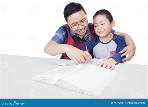 father teaching  son  study stock image image  asian reading