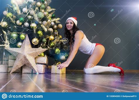 Happy Woman With T Under Christmas Tree Young Beautiful Girl In