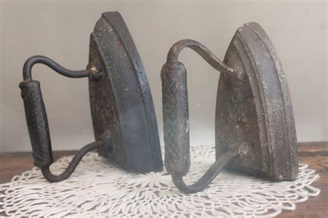 pair  antique cast iron sad irons  myvintagelane  etsy