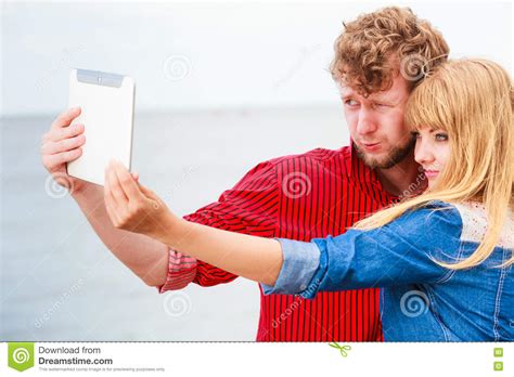 Young Couple Taking Self Picture Selfie With Tablet Stock Image Image