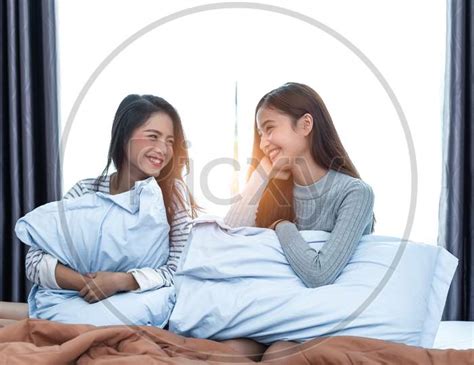 Image Of Two Asian Lesbian Women In Bedroom Couple People And Beauty