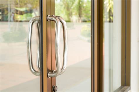 Close Up Of Aluminum Glass Door Handle Premium Photo