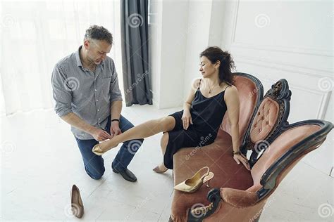Adult Man In Love A Fan Of Foot Fetish Tries On New Shoes For A Woman