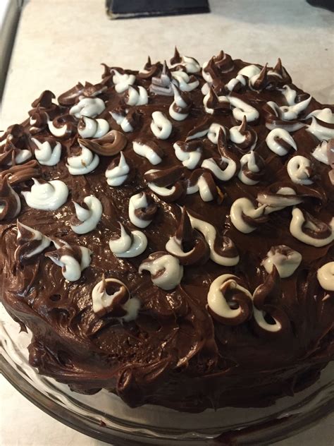 Vanilla Cake With Chocolate Frosting In And White Frosting Cake