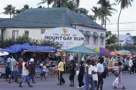barbados crop over festival visitors in front of mount gay rum distillery bb 0047 tif