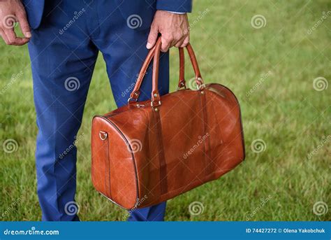 man  suit carrying suitcase stock photo image  ground meetings