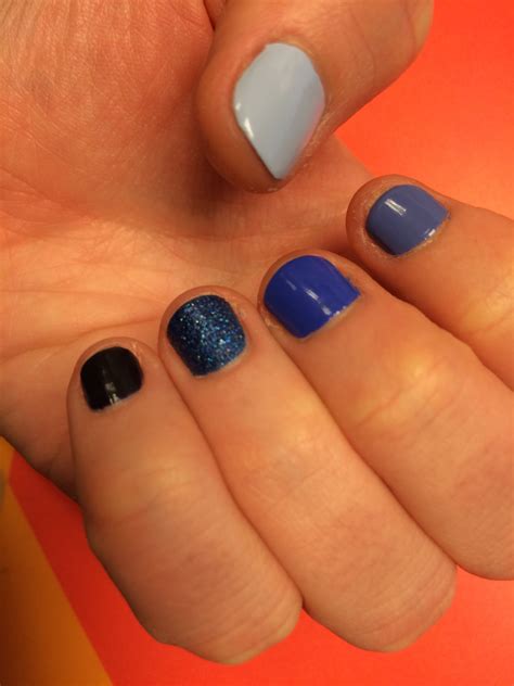 blue spectrum nails spectrum nail polish nails blue beauty finger