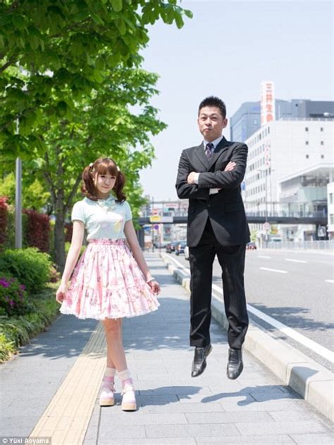 Bizarre Japanese Trend See Fathers Photographed Jumping Next To
