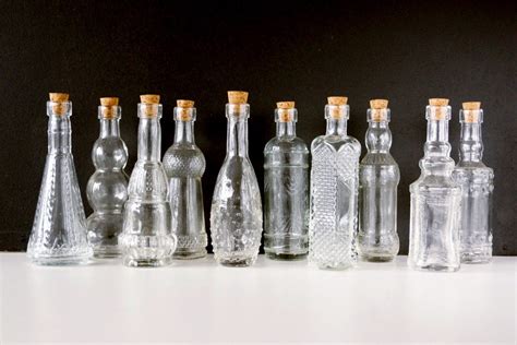 decorative clear glass bottles  corks  tall set
