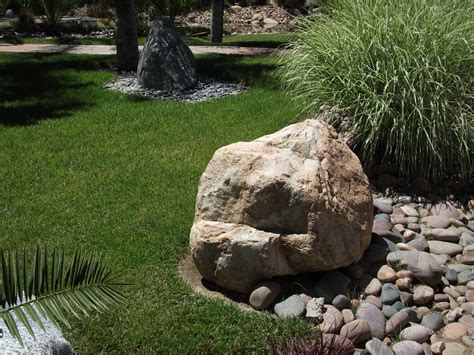 decorative boulders  landscaping   white landscaping ideas