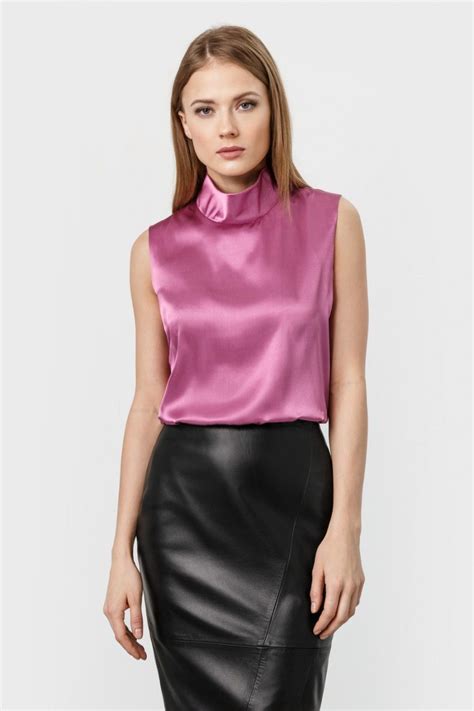 Pink Satin Sleeveless Blouse And Black Leather Skirt