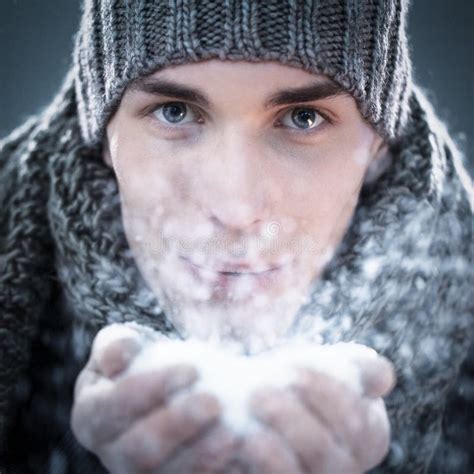 man blowing snow stock photo image  portrait heat