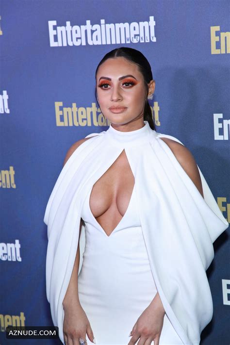 francia raisa showed off her cleavage posing in a white dress at the