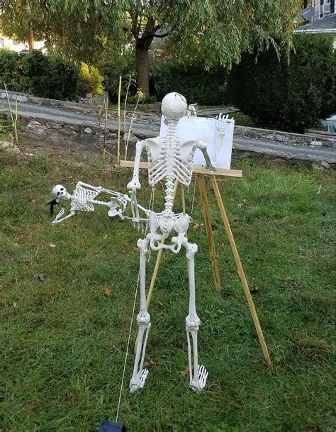 in photos stamford skeletons pose in couple s front yard each day