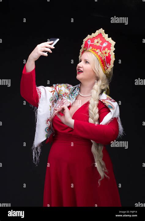 Girl Standing In Russian Traditional Costume Do Selfie Woman Is