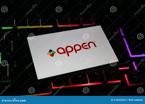 closeup  mobile phone screen  logo lettering  appen limited  computer keyboard