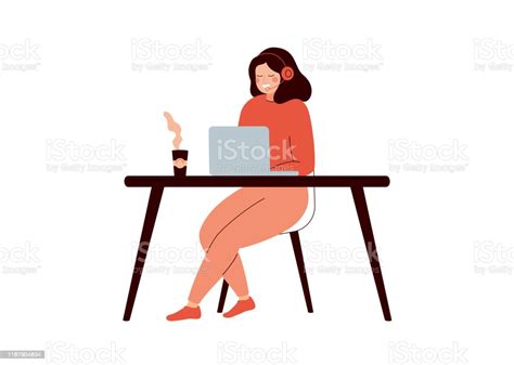 Happy Woman Sitting At Desk And Working On Laptop Computer Stock