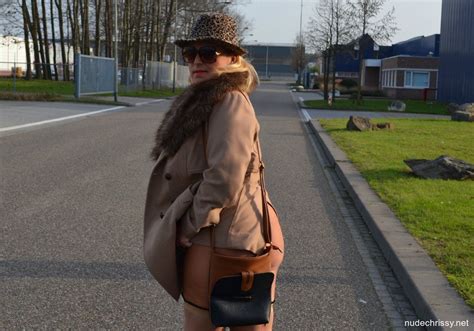 Busty Nude Chrissy Goes For A Naturist Walk Wearing Only A Fur Coat Photos