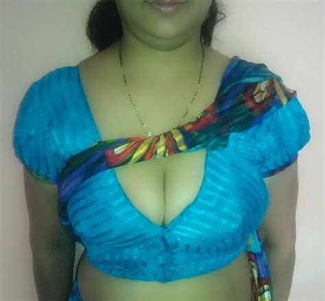 Big boobs in tight blouse
