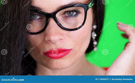 Green Background Chromeakey Portrait Of A Brunette Woman With Red