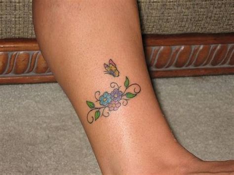 infomation point tattoo on leg for girls
