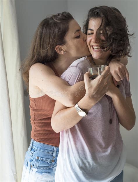 Lesbian Couple Together Indoors Concept Stock Image