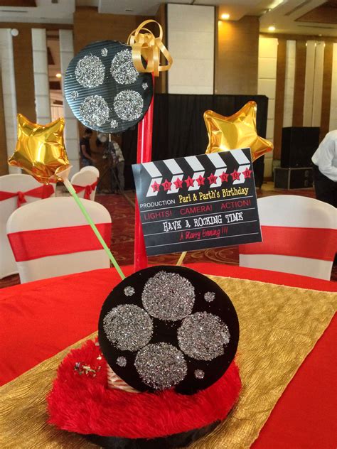bollywood theme party table centrepiece  discs  clapboard   touch  glam  fur