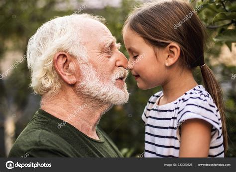 Granddaughter Touching Granddad – Telegraph