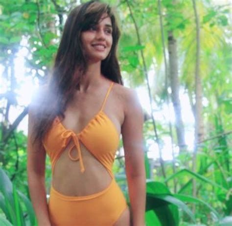 disha patani raises the temperature in a yellow bikini