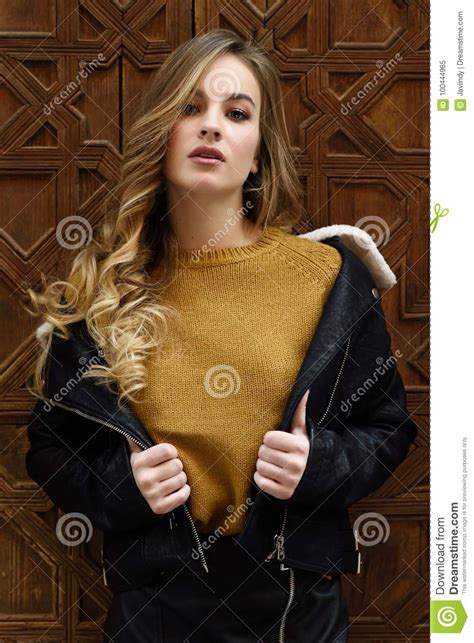 Beautiful Blonde Russian Woman In Urban Background Stock