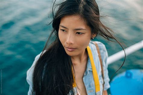 Woman On A Boat By Stocksy Contributor Marko Stocksy
