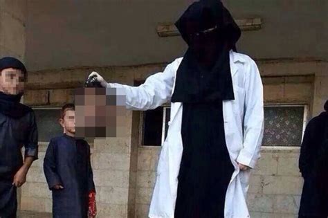 jihadi doctor in syria stands with severed head in her