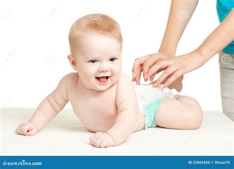 mother massaging  adorable baby stock photo image  curative