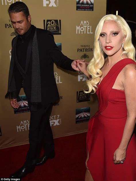 lady gaga kisses fiance taylor kinney at american horror