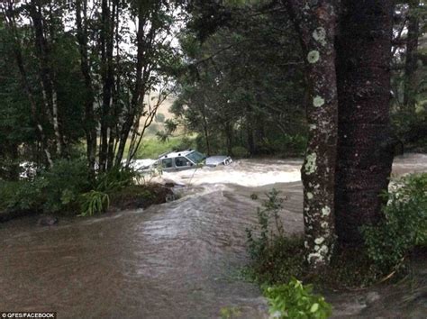 queensland weather storm kills 5 after cars are washed