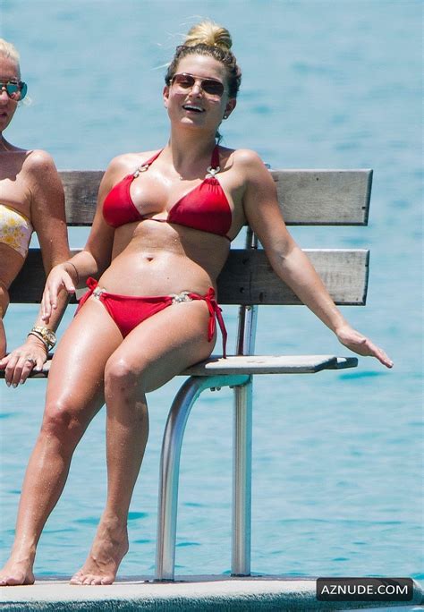zara holland spotted on the beach in barbados donning a sexy red piece
