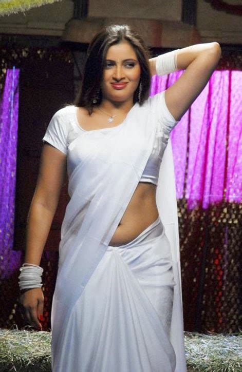 actress navneet kaur hot navel show in white saree stills cine gallery
