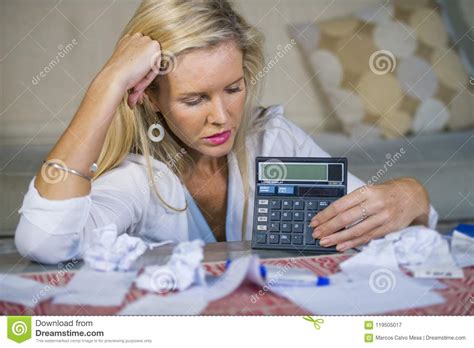 Worried And Desperate Blond Woman Calculating Domestic Money Exp Stock