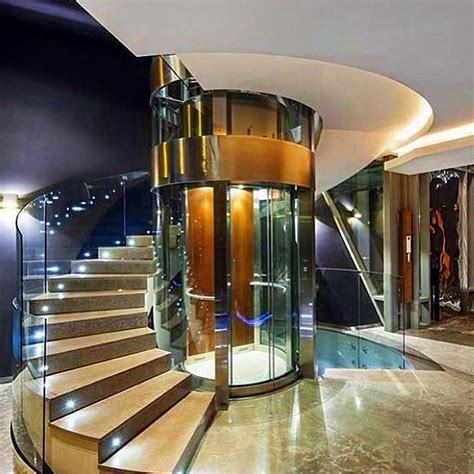 mansion homes  dream houses luxury real estate spiral staircase   glass elevator