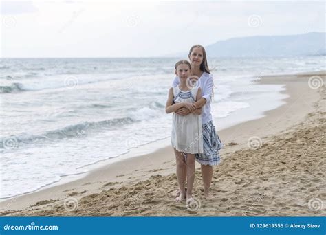 mother  daughter   beach stock photo image  ocean beach