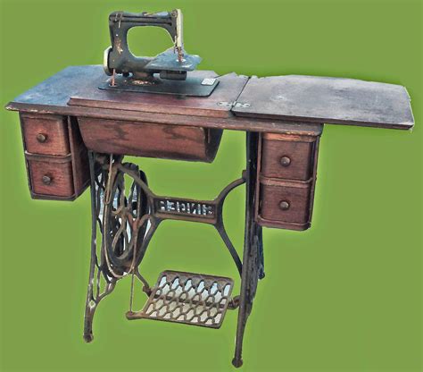 uhuru furniture collectibles  treadle sewing machine  sold