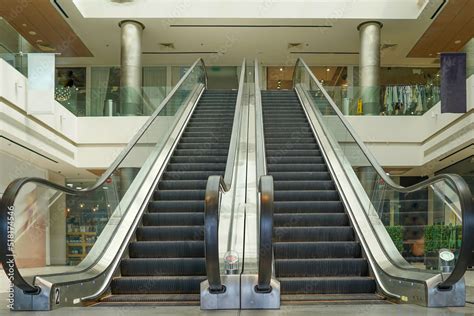 escalators   office building  mall empty escalator stairs
