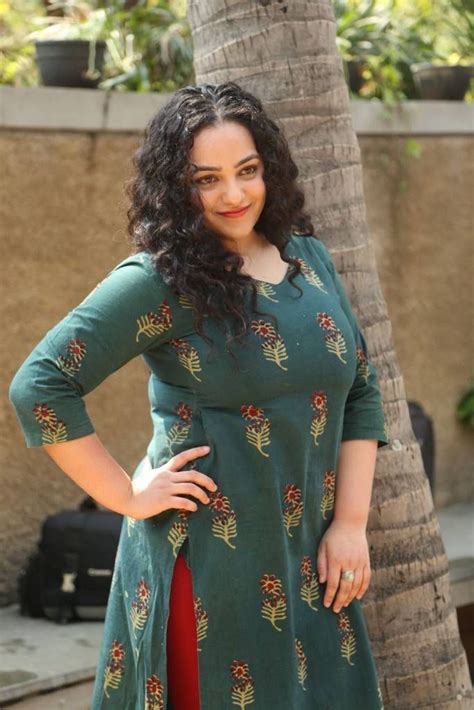 pin by itsme on nithya menon nithya menen aunty in saree actresses