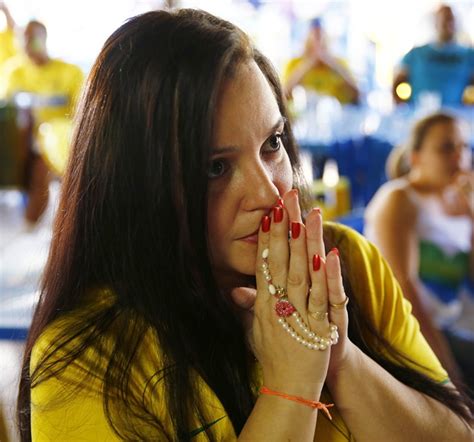 world cup photos brazilian fans pray for a miracle