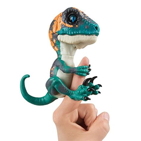 untamed raptor  fingerlings fury turquoise interactive collectible baby dinosaur