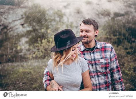 Young Camping Couple Fool Around In The Nature A Royalty Free Stock