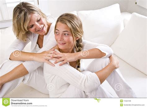 Mother And Teenage Daughter Talking At Home Royalty Free