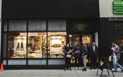 dr martens opens herald square  york flagship store footwear news