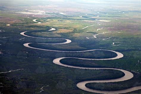 image  aerial view   curving river system austockphoto