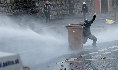 police  theresa   lift ban  water cannon uk news  guardian